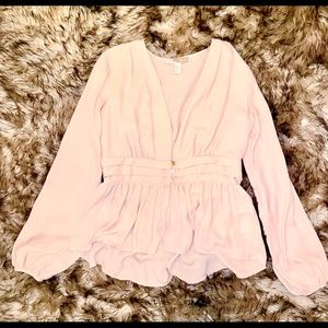 Woman’s Pink Peplum Blouse